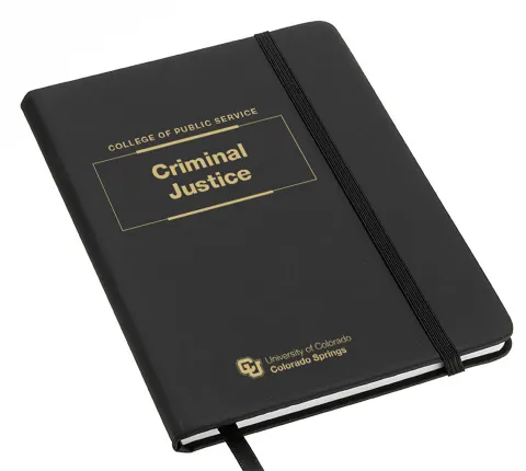 Mockup of a notebook with the new CU logo and CPS and Criminal Justice department name