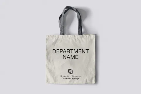 Mockup of a canvas bag with the new CU logo and department name