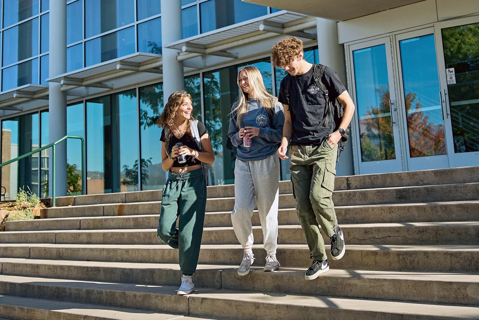 students walking out of Dwire hall
